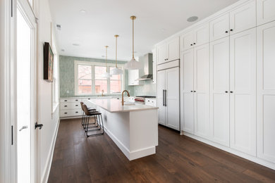 Inspiration for a mid-sized contemporary l-shaped dark wood floor enclosed kitchen remodel in DC Metro with an undermount sink, shaker cabinets, white cabinets, quartz countertops, green backsplash, stone tile backsplash, stainless steel appliances, an island and white countertops
