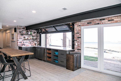 Home bar - industrial home bar idea in Denver