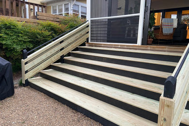 Deck - mid-sized craftsman backyard deck idea in Other