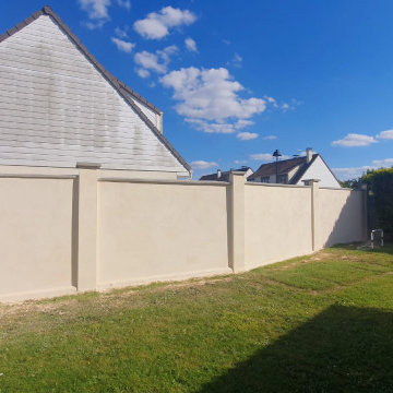 Ravalement d'un mur de clôture