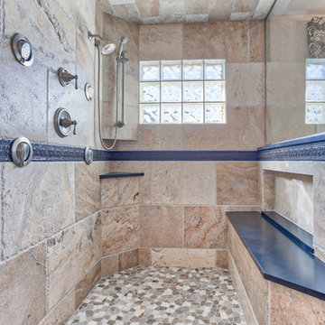 Expansive Traditional Steam Shower in a Spa Like Master