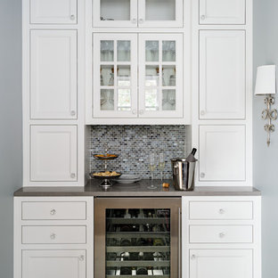 Mid-sized traditional kitchen pantry ideas - Mid-sized elegant porcelain floor kitchen pantry photo in Portland with shaker cabinets, white cabinets, quartzite countertops, blue backsplash, glass tile backsplash and stainless steel appliances