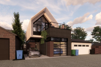 Inspiration for a small contemporary two-story mixed siding gable roof remodel in Calgary with a metal roof