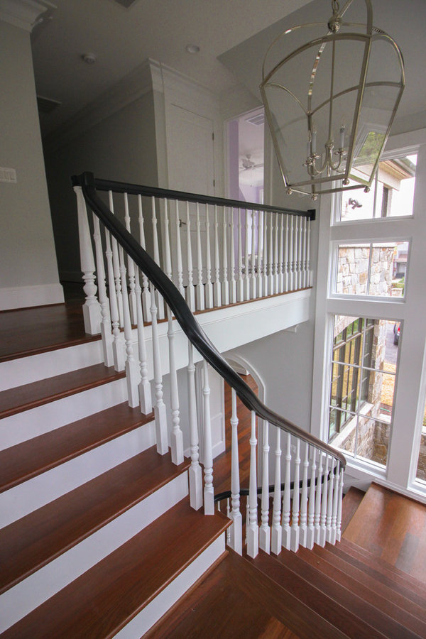 Powerful Impression by Floating Staircase in Suburban Foyer