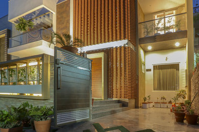 This is an example of a contemporary exterior in Delhi.