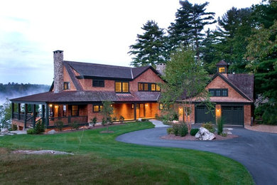 Example of a large classic two-story wood exterior home design in Boston