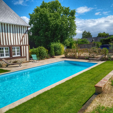 Une piscine pour une maison du pays d'auge.