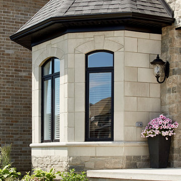 Tumbled Vintage / Mystick Grey Brick & Arriscraft Building Stone Home - Ontario