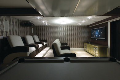 This is an example of a modern home cinema in Sussex.