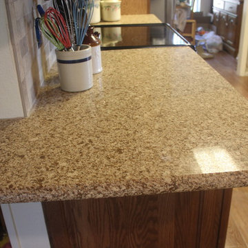 Tawny Oak Cabinets w/Chocolate Truffle Caesarstone and Subway Backsplash