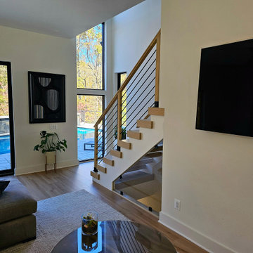 Project #111 | Open-Riser Staircase with Glass Panel Detail