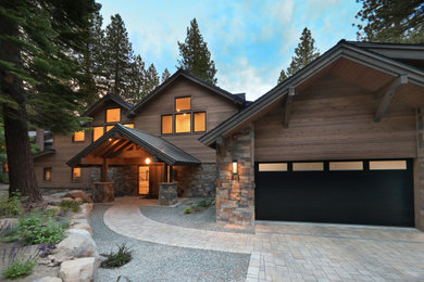 Contemporary two-story house exterior idea in Other