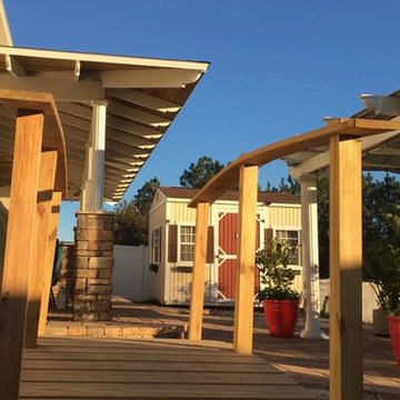 Outdoor Bar with Exposed Rafter Roofing & Paver Seating
