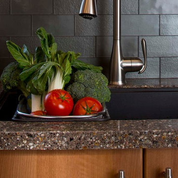 Contemporary kitchen with grey subway tiles
