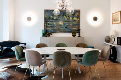 This is an example of a contemporary dining room in Paris.