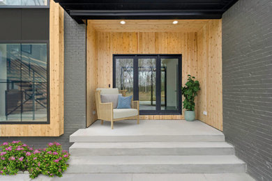 Design ideas for a contemporary house exterior in Louisville.