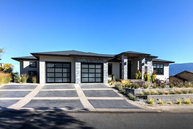 Example of a trendy concrete fiberboard exterior home design in Vancouver