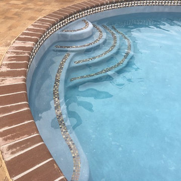 Lower Macungie large custom pool with spa, sunshelf, deck jets, and fountains