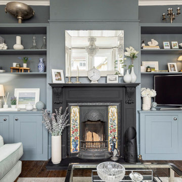 Calm & serene living room with a mix of chrome & brass metal accents