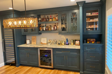 Inspiration for a coastal home bar remodel in Orlando