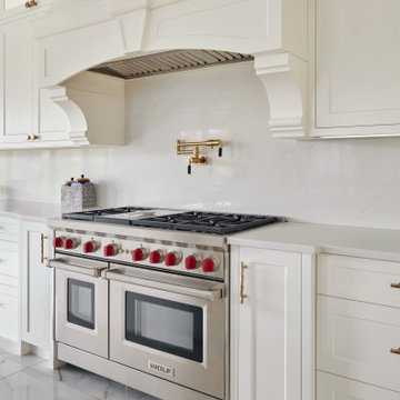 Transitional Kitchen with Decorative White Range Hood & Spice Pull Outs