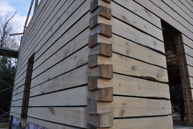 Rustic exterior home idea in Other