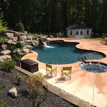 Stroud Township salt water pool with spa, sunshelf, slide, and waterfall