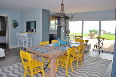 Design ideas for a tropical dining room in Orlando.