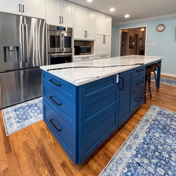 Kitchen with White Perimeter and Blue Island Cabinet Reface