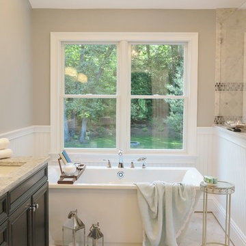 Transitional Striking Marble Master Bathroom in Avon