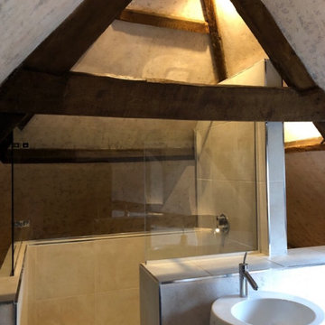 A distressed and beautiful shower in an attic
