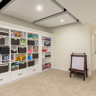 This is an example of a medium sized traditional look-out basement in Chicago with white walls, carpet, no fireplace and beige floors.