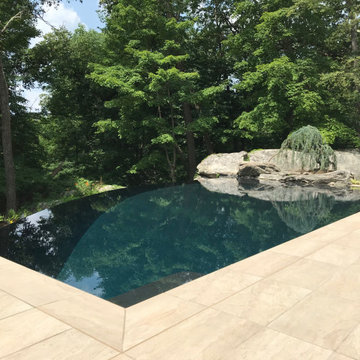 Modern Vanishing Edge Swimming Pool With Perimeter Overflow