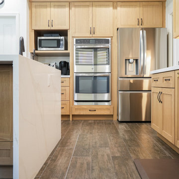 Modern Light Oak Shaker Kitchen with Waterfall Quartz Island P3| The Cabination