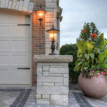 Cobblestone Landscape Renovation with Paver Pool Deck, Pergola, Outdoor Kitchen