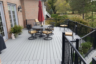Example of a huge eclectic backyard deck design in Cincinnati