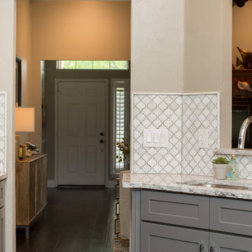 Kitchen | Two-Tone Cabinets | Cambria Quartz | Arabesque Marble Backsplash