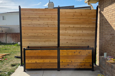 Example of a mid-sized minimalist home design design in Salt Lake City