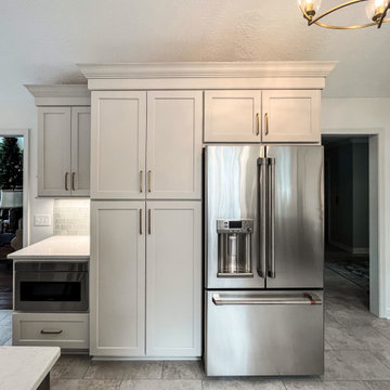 Two Tone Kitchen with Wood & Irish Creme Painted Cabinets w/ Quartz Countertop