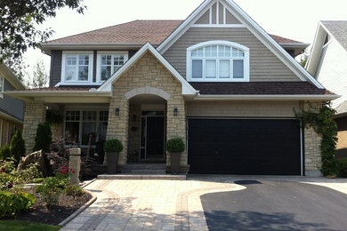 Example of a classic exterior home design in Ottawa