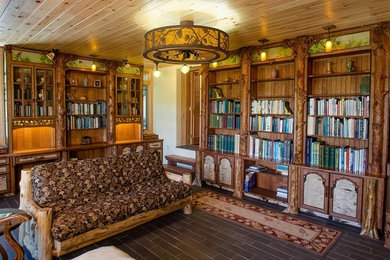 Inspiration for a large rustic built-in desk study room remodel in Burlington