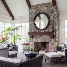 love this sunroom w/windows and fireplace
