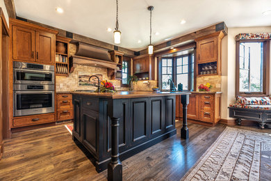 Country kitchen in San Francisco with distressed cabinets and granite benchtops.