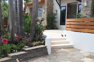 Example of a mid-sized minimalist white two-story mixed siding exterior home design in San Diego