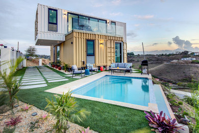 Mid-sized modern two-story exterior home idea in Other