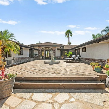 Grand Entry Courtyard with Fountain and Tropical Landscaping