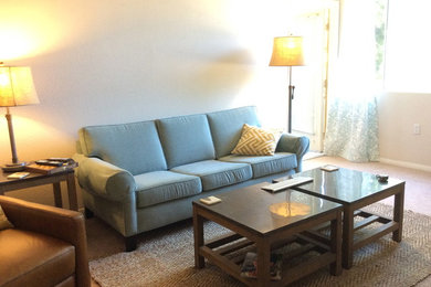 Example of a beach style open concept living room design in San Diego
