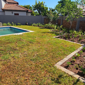 Midfield new garden, pool, paving and pergola