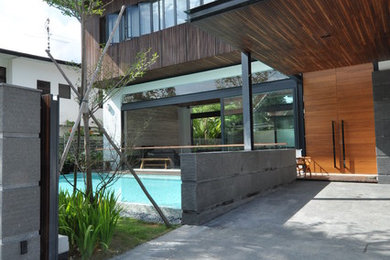 Photo of a contemporary home design in Singapore.
