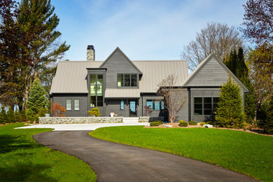 Inspiration for a coastal exterior home remodel in Grand Rapids